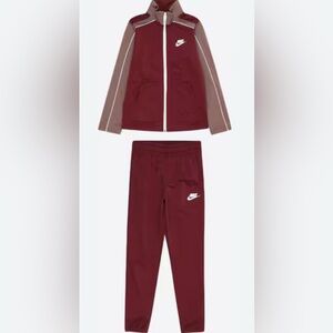 Nike girls burgundy tracksuit. Size youth large.